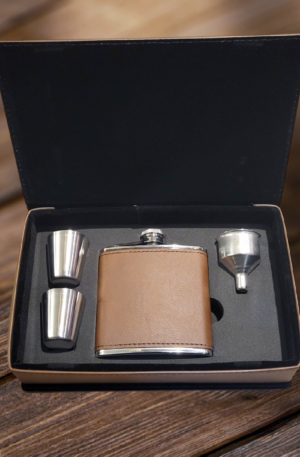 Leather wrapped flask set in leather case