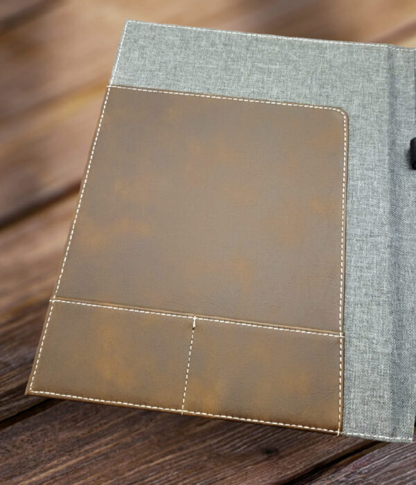 Inside flap of executive portfolio with custom engraving. Canvas and Leather